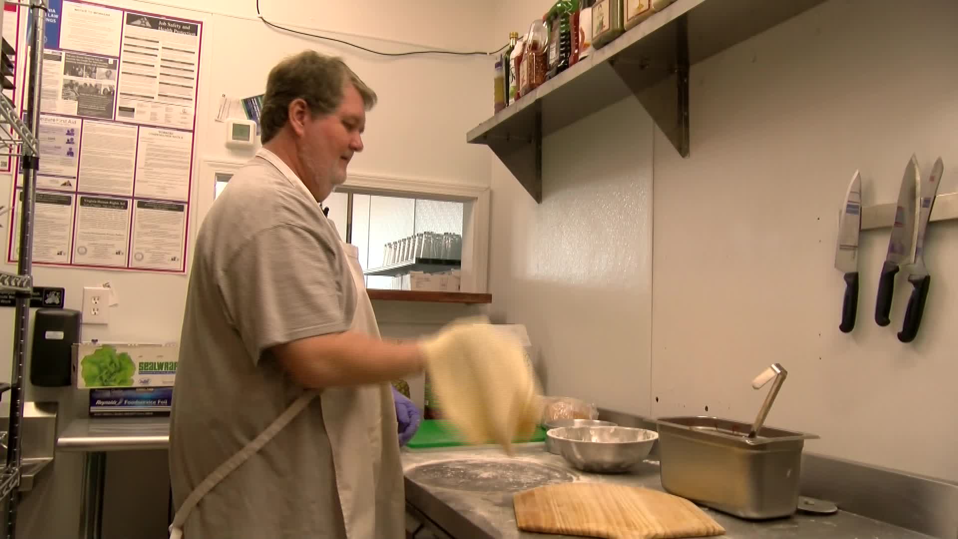 Ernie Warner from VB’s Dolcinea Pizzeria flips pizza dough